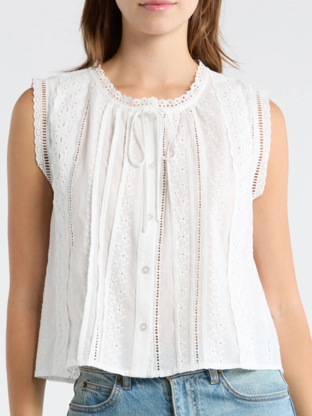 Lush embroidered sleeveless cotton button up top
